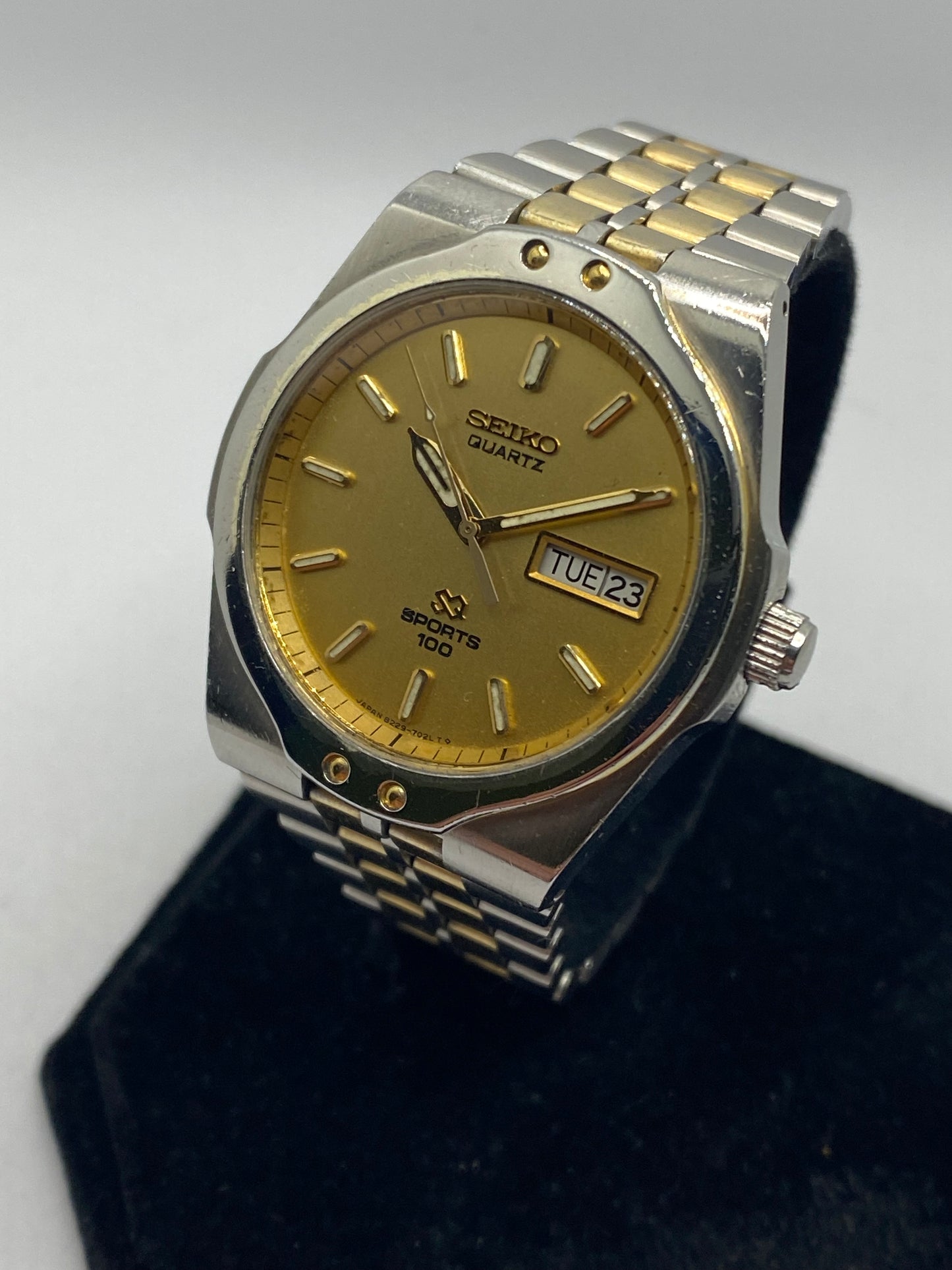 Seiko SQ Sports 100 Gold Dial Day Date Men’s Watch