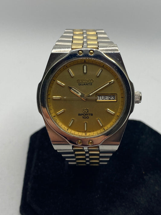 Seiko SQ Sports 100 Gold Dial Day Date Men’s Watch